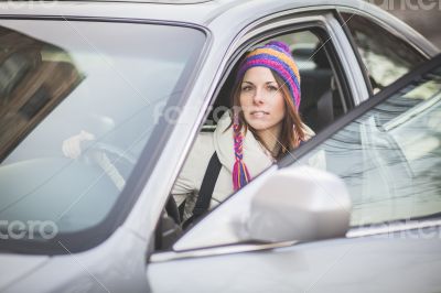 Young woman in a rental car Young woman in a rental car