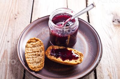 black currant jam in glass jar