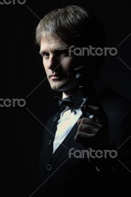 Portreit of a man with a gun