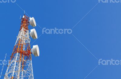 Telecommunication tower on blue sky background