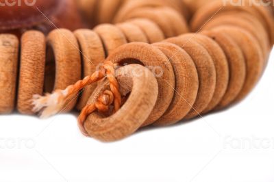 The wood beads on the white background The wood beads on the white background