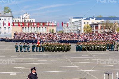 Russian soldiers march at the parade