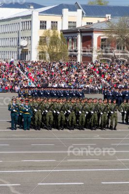 Russian soldiers march at the parade