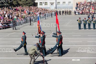 Russian soldiers march at the parade