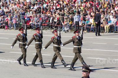 Russian soldiers march at the parade