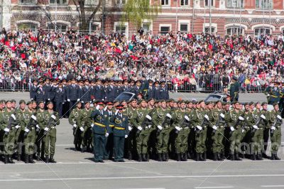 Russian soldiers march at the parade