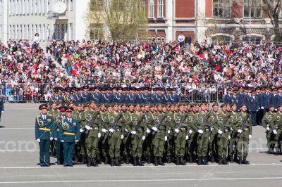 Russian soldiers march at the parade