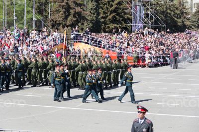 Russian soldiers march at the parade