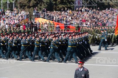 Russian soldiers march at the parade