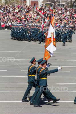 Russian soldiers march at the parade