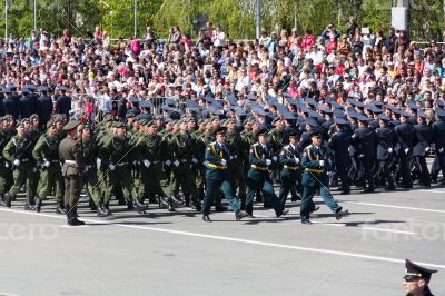 Russian soldiers march at the parade