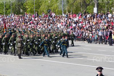 Russian soldiers march at the parade