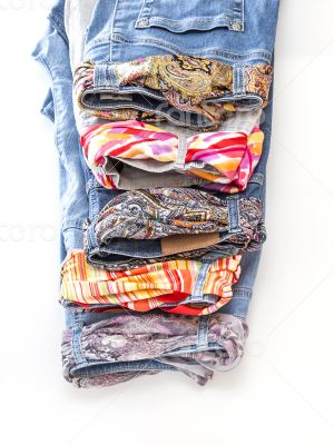 Women\'s jeans with motley silk belts