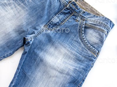 Jeans of indigo color on a show-window of shop