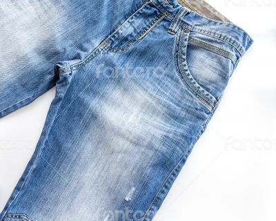 Jeans of indigo color on a show-window of shop