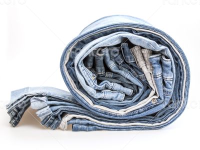 Jeans of indigo color on a show-window of shop