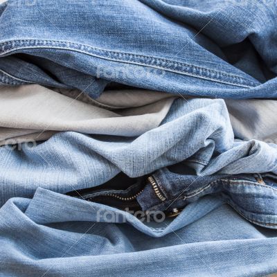 Jeans of indigo color on a show-window of shop