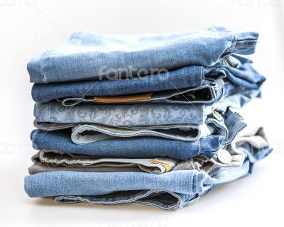 Jeans of indigo color on a show-window of shop
