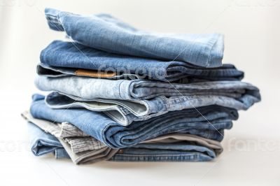 Jeans of indigo color on a show-window of shop