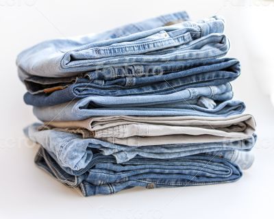 Jeans of indigo color on a show-window of shop