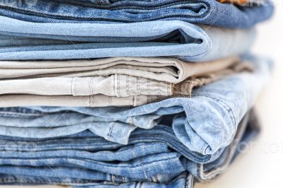 Jeans of indigo color on a show-window of shop