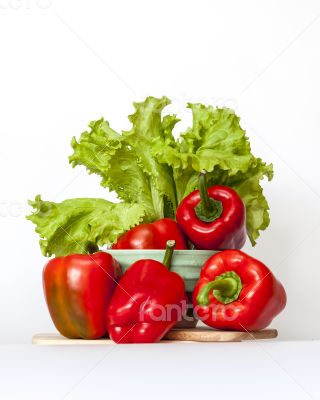 Large red paprika and bunch of fresh salad