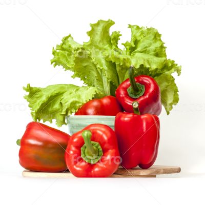 Large red paprika and bunch of fresh salad