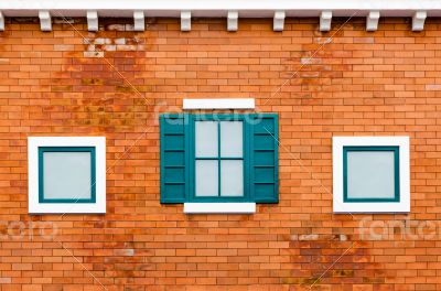 Window on the orange brick wall