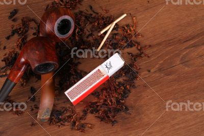 The Tabacco Pipe On The Wood Unhealthy