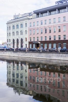 The river embankment Moscow and its reflection