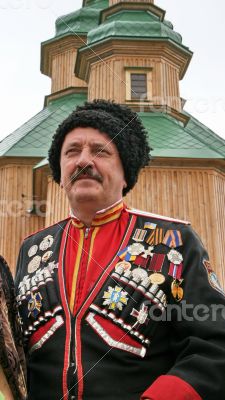 Ukrainian cossack general under wooden church