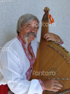 Senior ukrainian musician kobzar with bandura