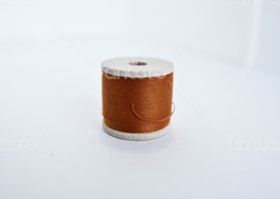Brown spool of thread
