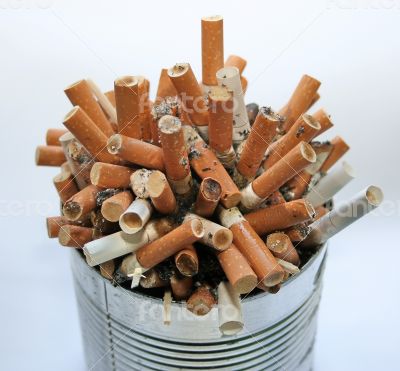 ashtray full with cigarette butt garbage pile