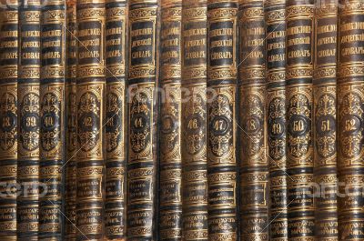 Row of old books cover spines