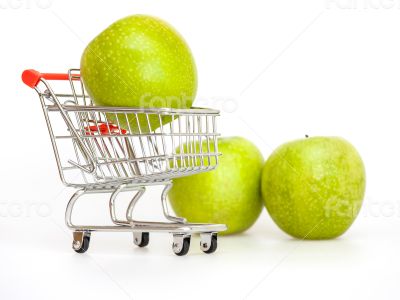 Large green apples in the cart for shopping