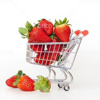 Large ripe strawberry in the cart for shopping