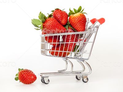 Large ripe strawberry in the cart for shopping