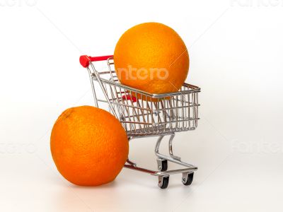 Large bright oranges in the cart for shopping