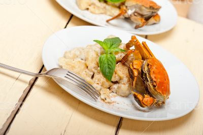 Italian gnocchi with seafood sauce with crab and basil Italian gnocchi with seafood sauce with crab and basil