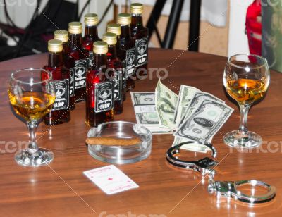 money and glass of whiskey money and glass of whiskey