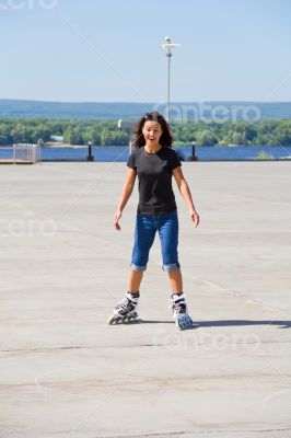 Young woman on roller skates