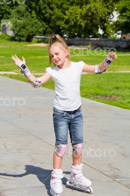 Learning girl on roller skates