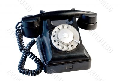 Black vintage phone isolated on white