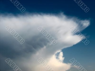 Big cloud on blue sky