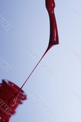 Brush with a red paint