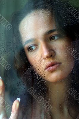 The girl behind glass