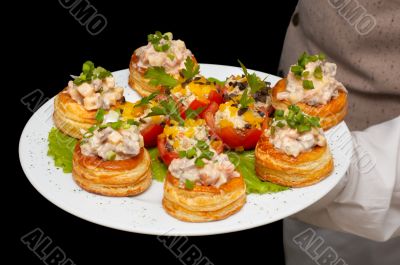 tartlets with salad on dish