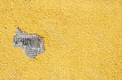 yellow punched stucco