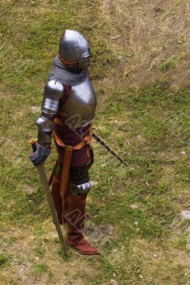 Armoured knight with swords
